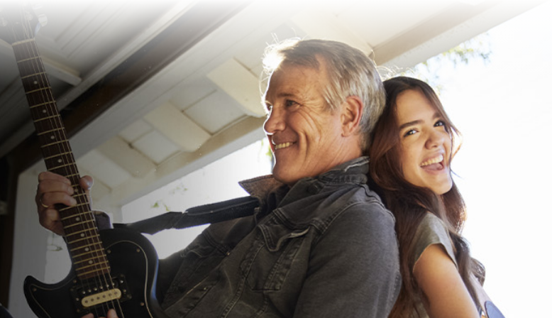 Image alt tag Image of a father and daughter smiling together